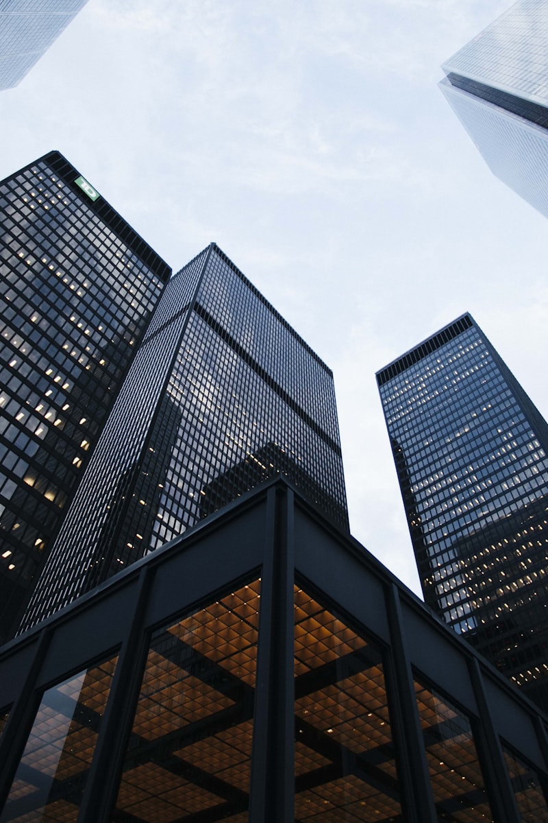 Modern skyscraper buildings shot from below, real estate listing context